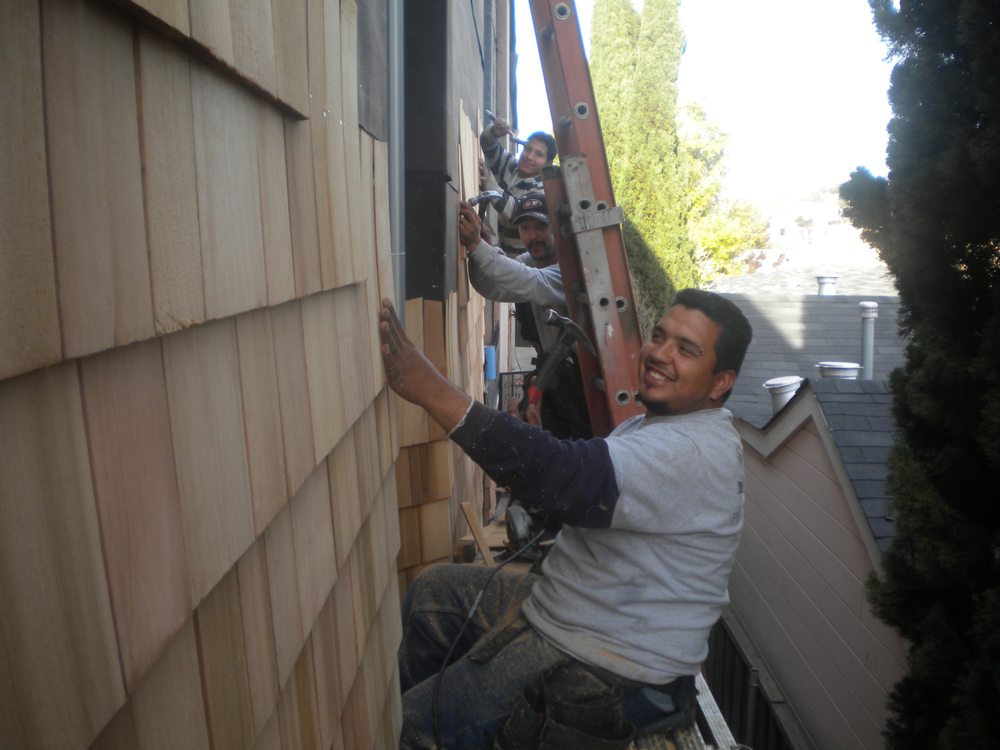 Slide of All Weather Roofing