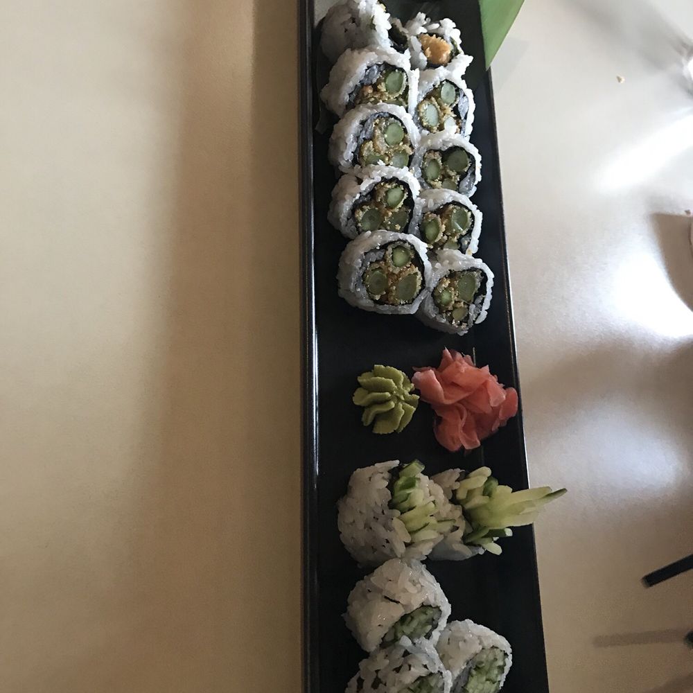 Ume Sushi - a long rectangular plate with sushi on it - Sushi Bars Near Me - Bolton, Ontario Ume Sushi - a long rectangular plate with sushi on it - Sushi Bars Near Me - Bolton, Ontario