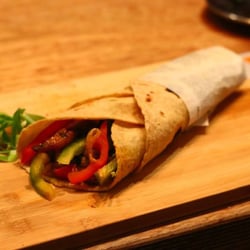 Bombay Street Kitchen - Bombay Frankie Roll - delicious fillings with spicy coriander chutney & caramelised onions wrapped in a wholemeal roti!
