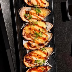 Baked mussels are a must and this didn't disappoint. The lack of color was off putting but the flavor is there