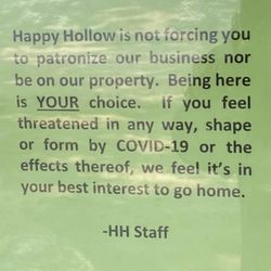 Happy Hollow Grocery - Sign hanging at the reviewed business.