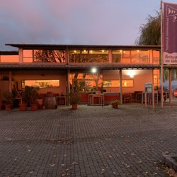 Restaurant am Häfele - Westseiten Ansicht des Restaurants bei Sonnenuntergang