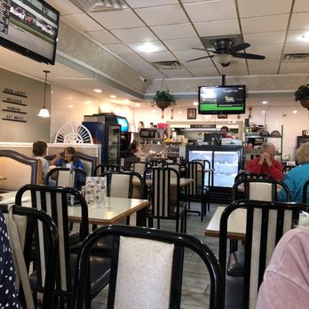 Sunrise Cafe - diners sitting at tables and watching televisions - Breakfast & Brunch Near Me - DeWitt, Iowa