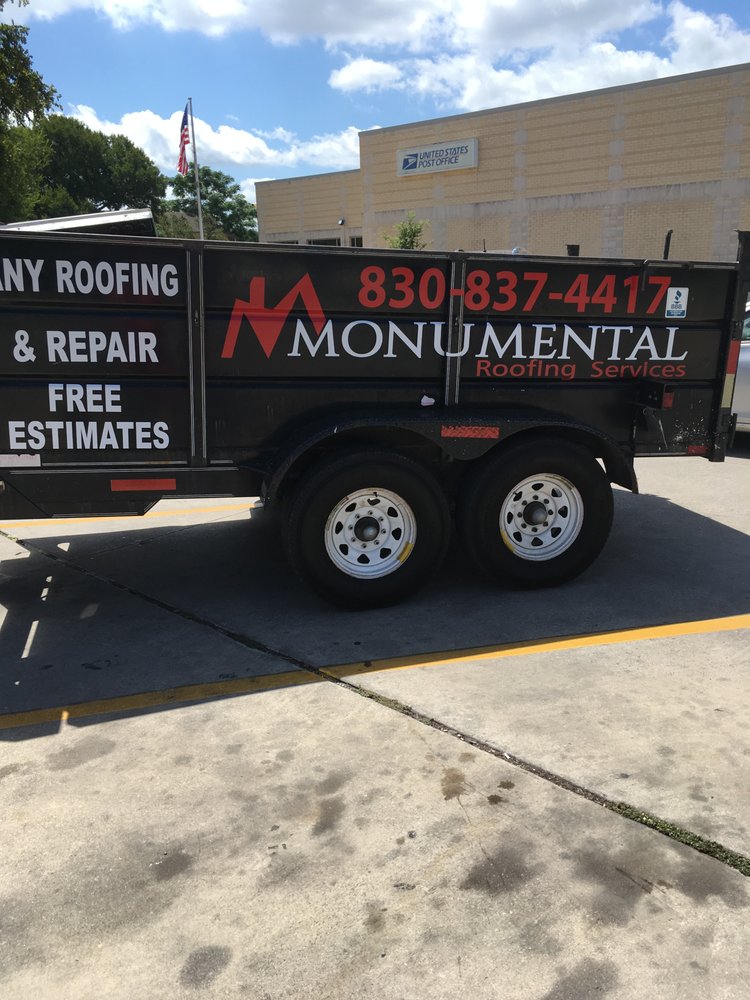 Slide of Monumental Roofing Services