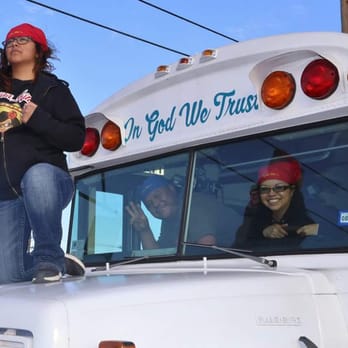 Fajita Ritas - a woman standing on the top of a school bus - Food Trucks Near Me Fajita Ritas - a woman standing on the top of a school bus - Food Trucks Near Me