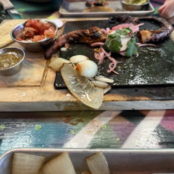 Tempo Cantina - Sad table side octopus barely flambéed and onion still raw in the middle. - New American Near Me - Brea, California