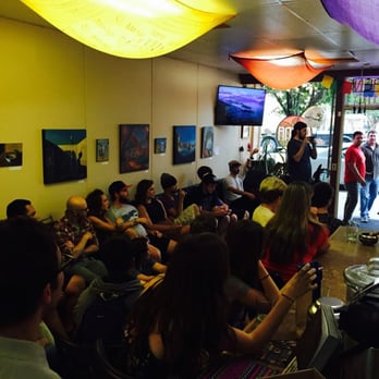 Mana Bar - a group of people sitting in a room - Coffee & Tea Near Me - Lawrence, Kansas