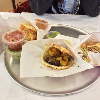 Guasaca - 3 arepas. The middle has pork with plantains, beans and onions. - Venezuelan Near Me - Raleigh, North Carolina