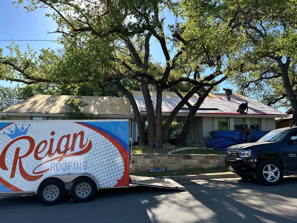 Slide of Reign Roofing