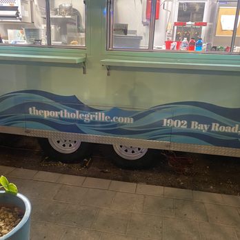 The Porthole Grille - the side of a food truck - Food Trucks Near Me - Sarasota, Florida The Porthole Grille - the side of a food truck - Food Trucks Near Me - Sarasota, Florida