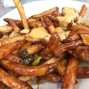 Mushkaki's - Mushkaki fries, sauced up tooooo good!!! - African Near Me - Toronto, Ontario