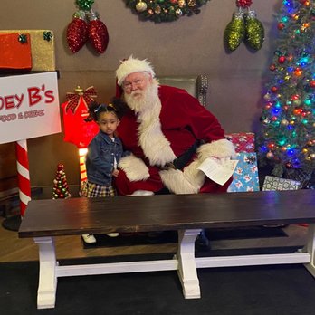 Joey Bs - santa sitting on a bench with a child - Italian Near Me - Saint Louis, Missouri Joey Bs - santa sitting on a bench with a child - Italian Near Me - Saint Louis, Missouri