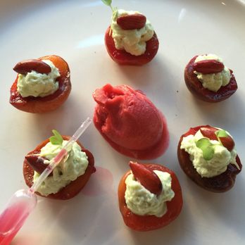 La Table du Marché - Wine-marinated apricots with pistachio cream, raspberry sorbet, and rose water. - French Near Me - Bergerac, 24