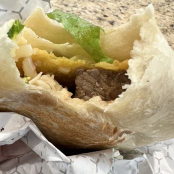 Angie's Lobster - One of the crunch wrap, Supremes we ordered without lettuce - Fast Food Near Me - Surprise, Arizona Angie's Lobster - One of the crunch wrap, Supremes we ordered without lettuce - Fast Food Near Me - Surprise, Arizona
