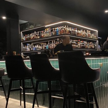 sousòl - The well lit bar with lovely green tile, chairs with backrests, and purse hooks - Bars Near Me - Portland, Oregon sousòl - The well lit bar with lovely green tile, chairs with backrests, and purse hooks - Bars Near Me - Portland, Oregon