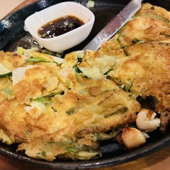 Aroma Korea - Haemul pajeon (savory seafood pancake) - Korean Near Me - Cary, North Carolina Aroma Korea - Haemul pajeon (savory seafood pancake) - Korean Near Me - Cary, North Carolina