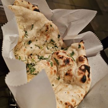 Nawab Indian Cuisine - A basket with the Garlic Naan. - Indian Near Me - Roanoke, Virginia Nawab Indian Cuisine - A basket with the Garlic Naan. - Indian Near Me - Roanoke, Virginia