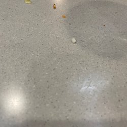 McDonald's - All tables are dirty; trash is filled; no ketchup, lids, pepper etc