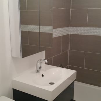 3D's Renovations LLC - a bathroom with a sink, toilet, and bathtub - General Contractors Near Me - Irvington, New Jersey 3D's Renovations LLC - a bathroom with a sink, toilet, and bathtub - General Contractors Near Me - Irvington, New Jersey