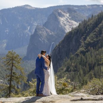 Scenic Vows - A couple share their first dance together on their wedding day in Yosemite - Event Photography Near Me Scenic Vows - A couple share their first dance together on their wedding day in Yosemite - Event Photography Near Me