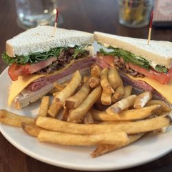 Jack Mason's Tavern and Brewery - Delish stacked club sandwich on sourdough & fries!