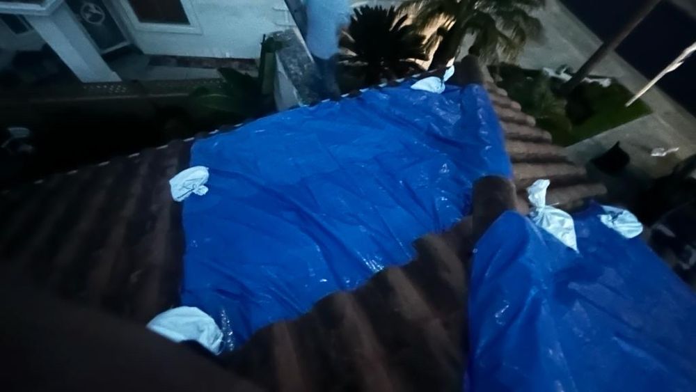 Slide of Spootless Roofing