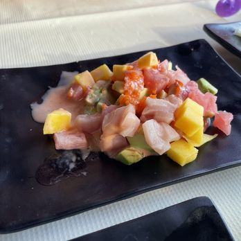 Sake Sushi - Chefs choice, dressing brought down the dish - Sushi Bars Near Me - Madison, Wisconsin