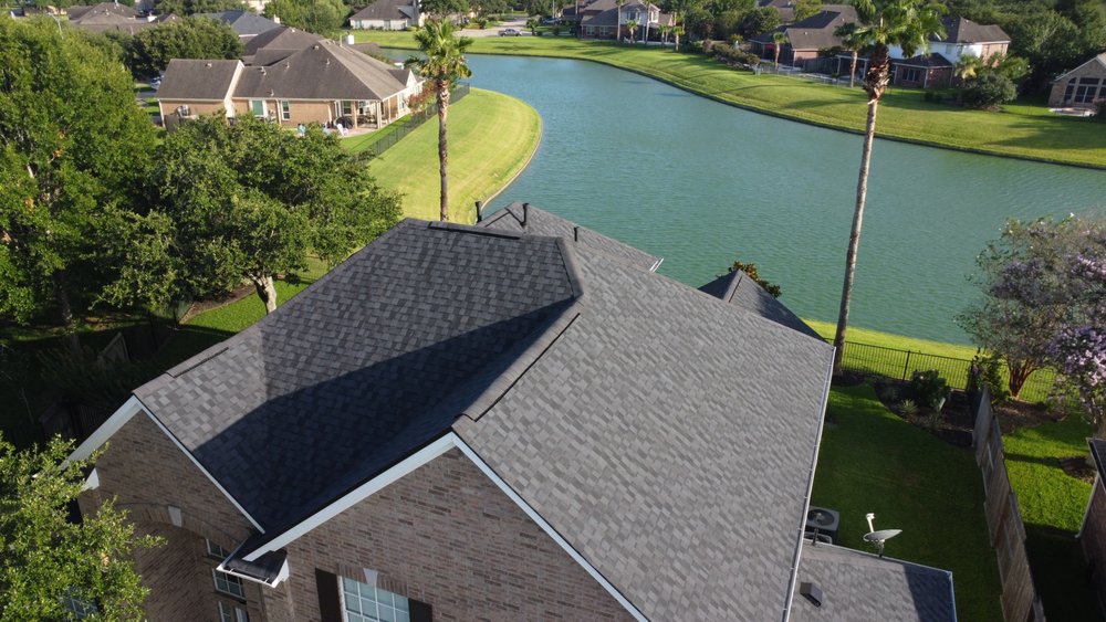 Slide of All The Way Up Roofing & Construction