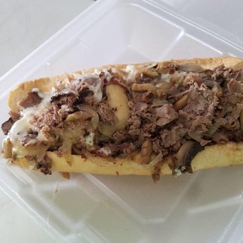 Robins Roost - a sandwich in a plastic container - Cheesesteaks Near Me - Quartzsite, Arizona Robins Roost - a sandwich in a plastic container - Cheesesteaks Near Me - Quartzsite, Arizona