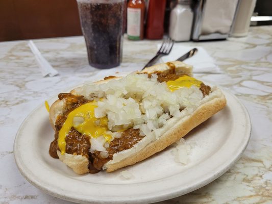 Photo of Duly's Place - Detroit, MI, US. a chili dog with onions and mustard