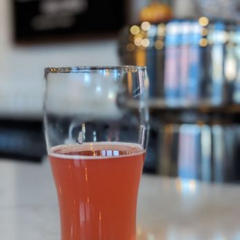 Little Brother Brewing - a glass of beer on a counter - Breweries Near Me - Greensboro, North Carolina