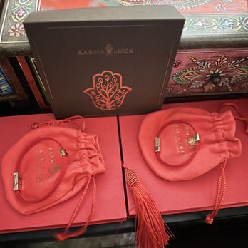 Karma and Luck - Large Men's supposed size 7.75" on the left. Same bracelet on the right X-small in women's supposed size 6.25". - Spiritual Shop Near Me - Las Vegas, Nevada