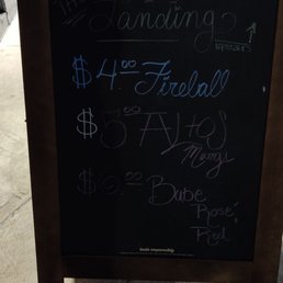 Sign listing their specials that they aren't honoring.