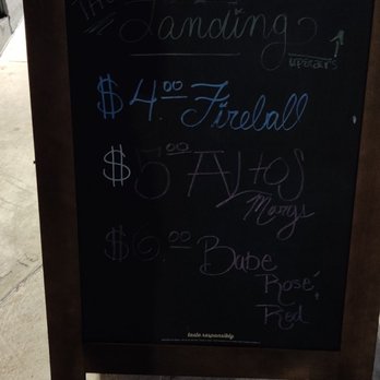The landing - Sign listing their specials that they aren't honoring. - Bars Near Me - Saint Petersburg, Florida