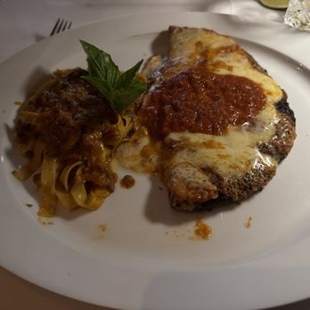 Il Mulino Prime - Soho - Veal Parmesan with side of pasta bolognese - Steakhouses Near Me - New York, New York Il Mulino Prime - Soho - Veal Parmesan with side of pasta bolognese - Steakhouses Near Me - New York, New York