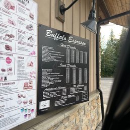 a menu on the outside of a restaurant