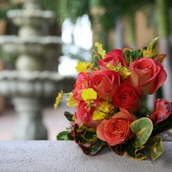 Sander Ranch Flowers - Orange roses yellow cymbidium orchid bouquet