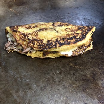 Luna Latin Cuisine - Cachapa (sweet corn flat cake filled w/ Chihuahua cheese and roasted pork) - Latin American Near Me - Birmingham, Alabama Luna Latin Cuisine - Cachapa (sweet corn flat cake filled w/ Chihuahua cheese and roasted pork) - Latin American Near Me - Birmingham, Alabama