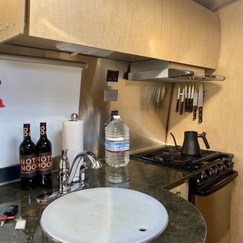 Hart's Camp - Kitchen is well equipped. (Disclosure: Bottles of wine and water are ours, not included in the stay). - Vacation Rentals Near Me - Pacific City, Oregon Hart's Camp - Kitchen is well equipped. (Disclosure: Bottles of wine and water are ours, not included in the stay). - Vacation Rentals Near Me - Pacific City, Oregon