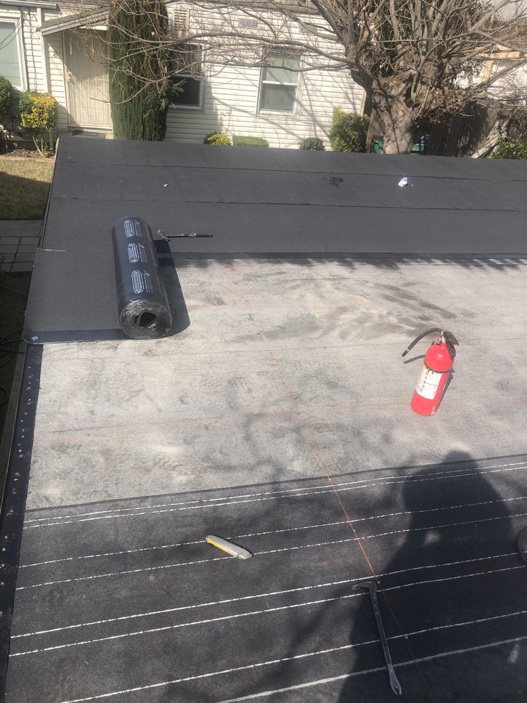 Slide of East Bay Roofing