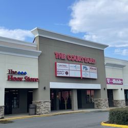 JoJo's Beauty Supply - The outside banners with store names. If you're not paying attention, you may miss the beauty supply store.