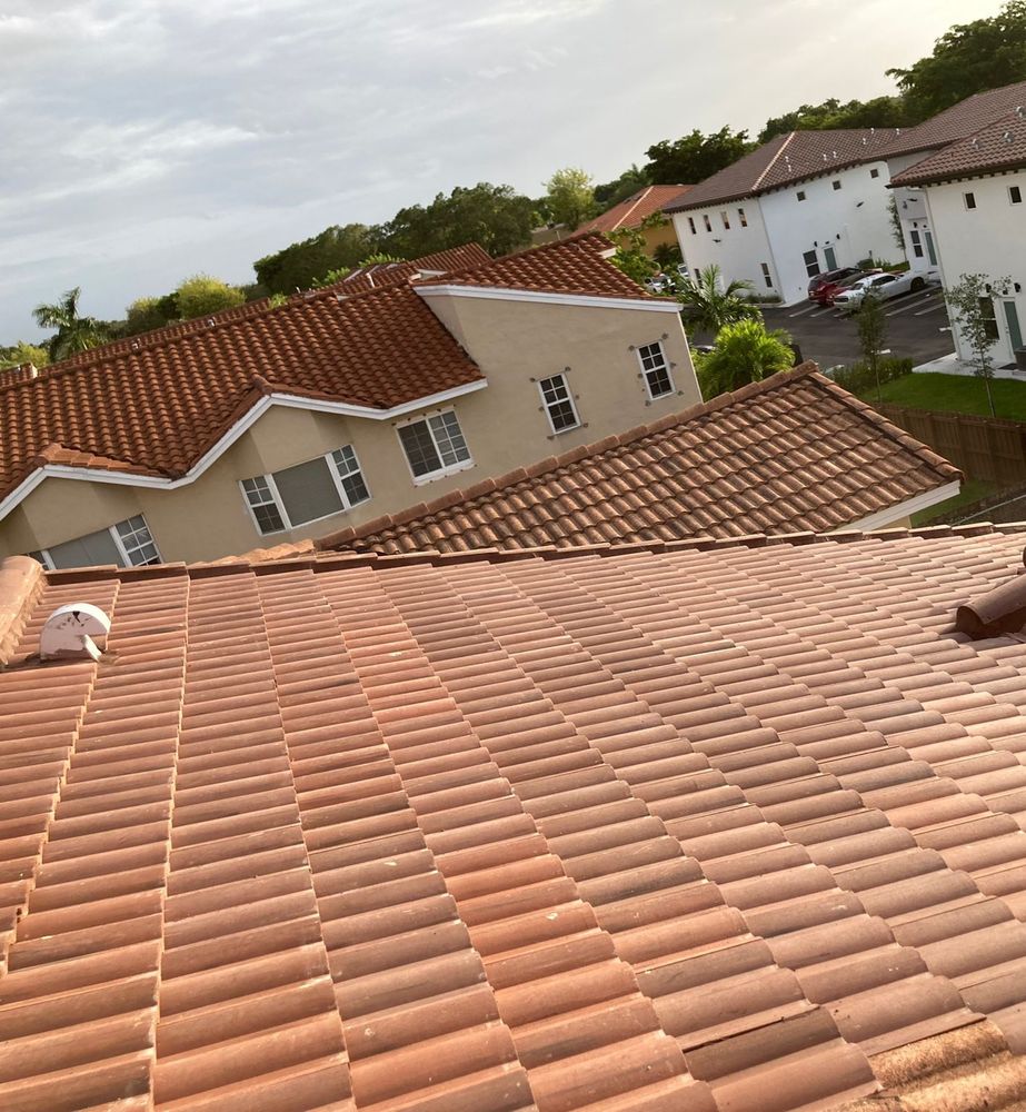 Slide of JMR Roofing Services