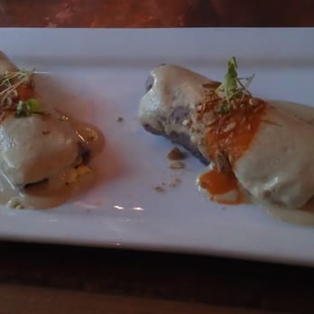 Hugo's - HRW: Menú de Vino Rojo Appetizer (Taquitos, one with hard boiled egg and one with trout) - Mexican Near Me - Houston, Texas