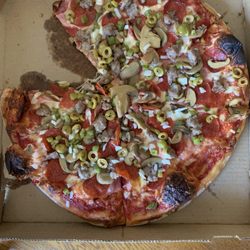 Ginos Pizza - Large Deluxe pizza.