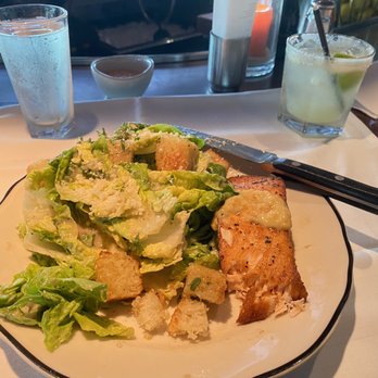 Houston's Restaurant - Caesar Salad added a piece of salmon- they had homemade croutons! Delicious - New American Near Me - Boca Raton, Florida