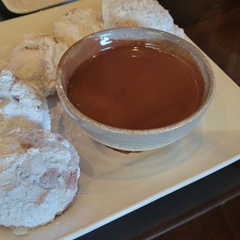 Bosscat Kitchen & Libations - Beignets with chocolate sauce - New American Near Me - Houston, Texas Bosscat Kitchen & Libations - Beignets with chocolate sauce - New American Near Me - Houston, Texas