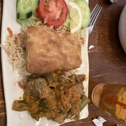 Lamb achari  with mango chutney , rice and an unusual naan