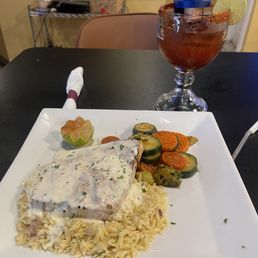 Swordfish over orzo with a vegetable medley. Very moist and delicious.