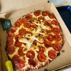 Papa Johns Pizza - Foot ball shaped pizza for the Super Bowl