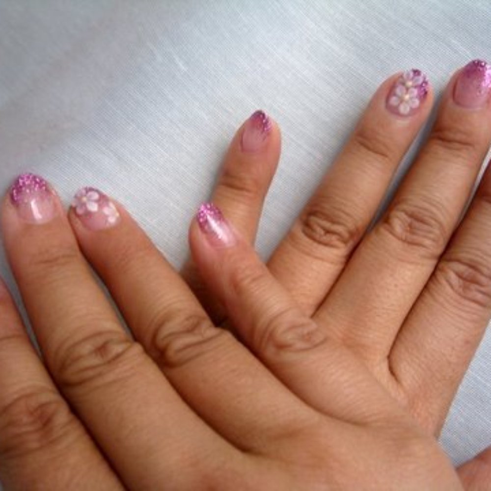 Adrienne Nails - Simple glitter fade, but love the little daisies. - Nail Technicians Near Me - Honolulu, Hawaii Adrienne Nails - Simple glitter fade, but love the little daisies. - Nail Technicians Near Me - Honolulu, Hawaii